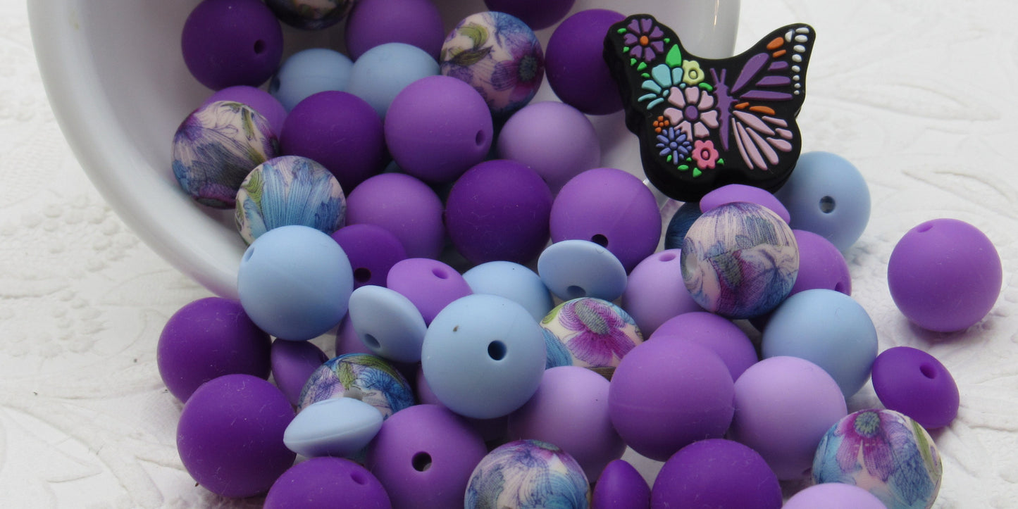 Silicone Purple Floral 15mm Bead Mix, with Coordinating Colored Beads.