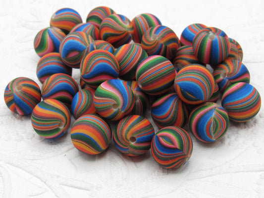 Multicolored striped beads on a white background