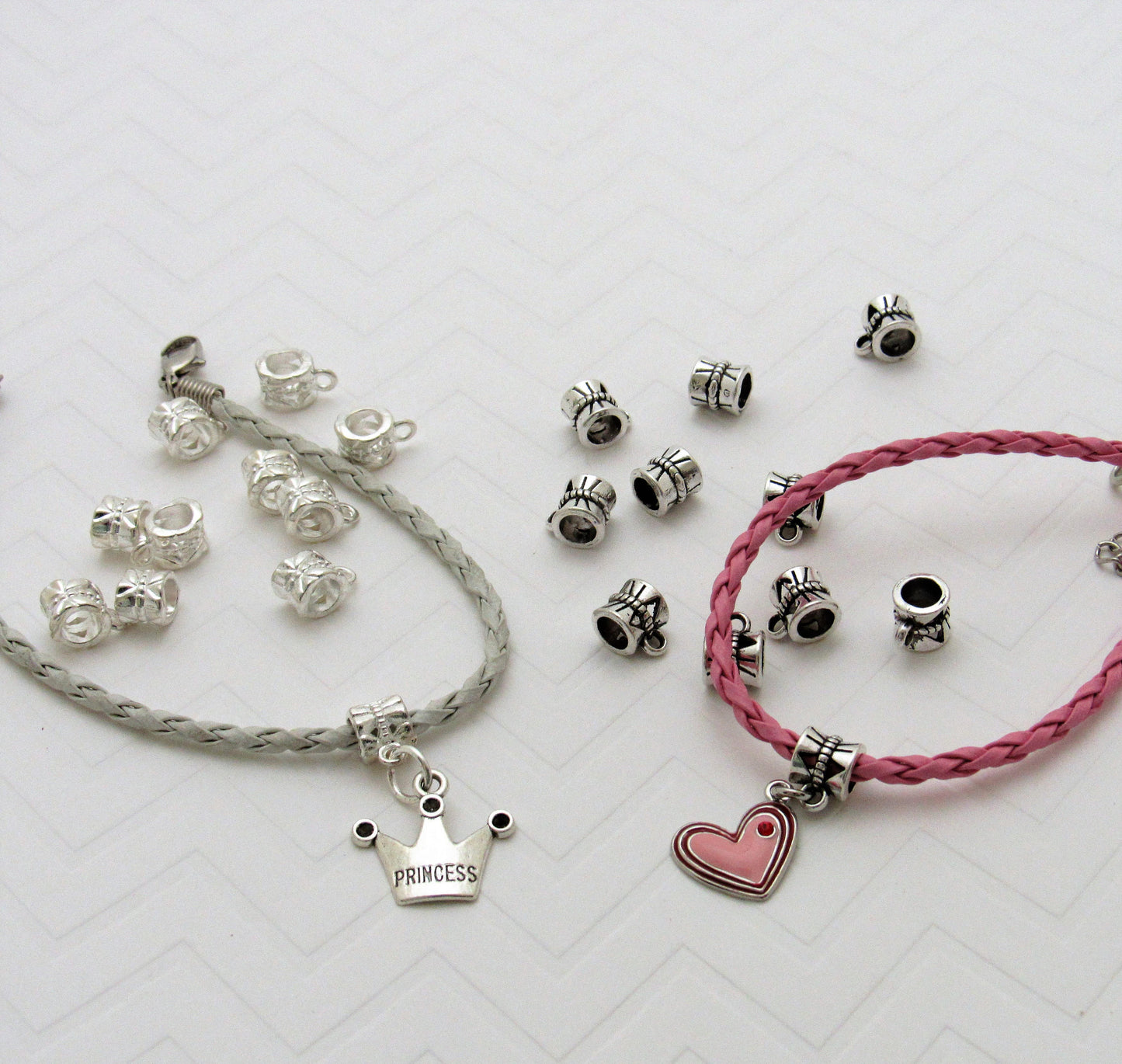 QTY 20 Silver European Charm Hanger 11mm X 7mm used for dangling charms, fits most charm braclets, inner Diameter of 5mm.  Charm bead holder