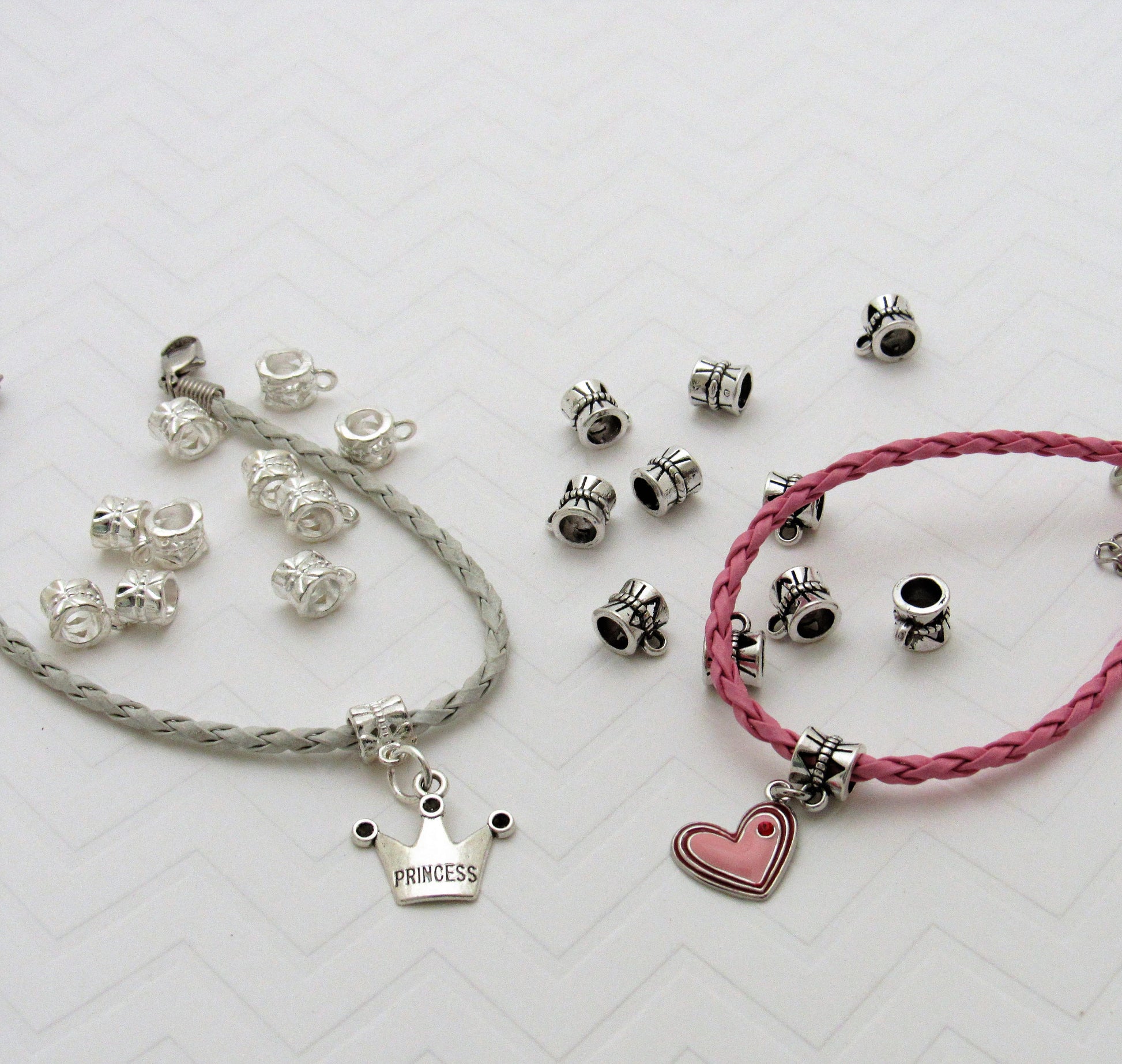 QTY 20 Silver European Charm Hanger 11mm X 7mm used for dangling charms, fits most charm braclets, inner Diameter of 5mm.  Charm bead holder